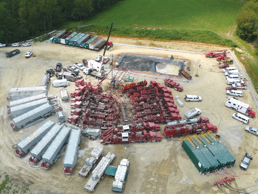 Hydrofracking pumps and trucks, teaming up on that hole Hydrofracking pump trucks