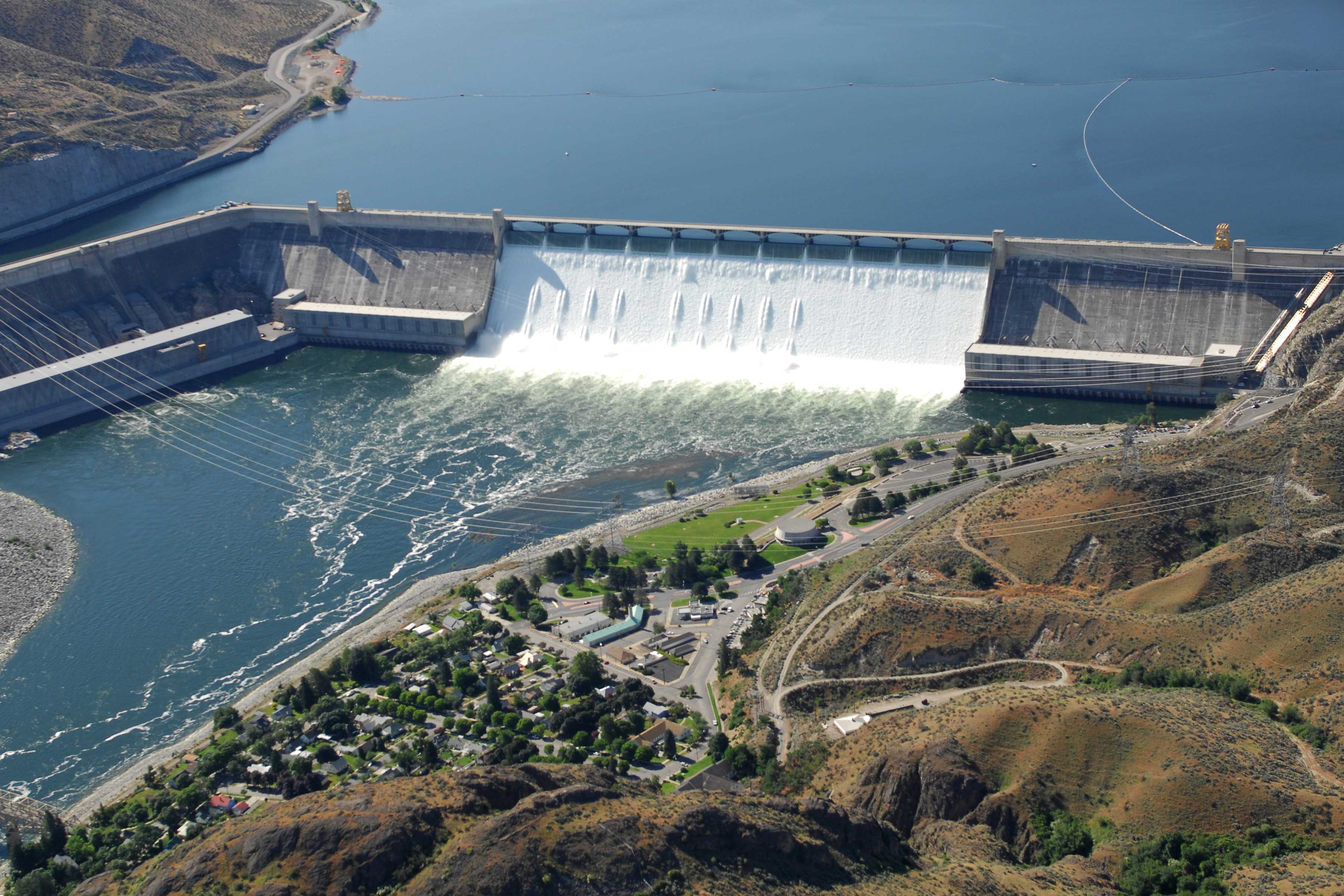 Grand Cooulee Dam is one of the largest dams in the world. Notice the size of the houses for scale. 